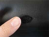 appling scratch repair to leather